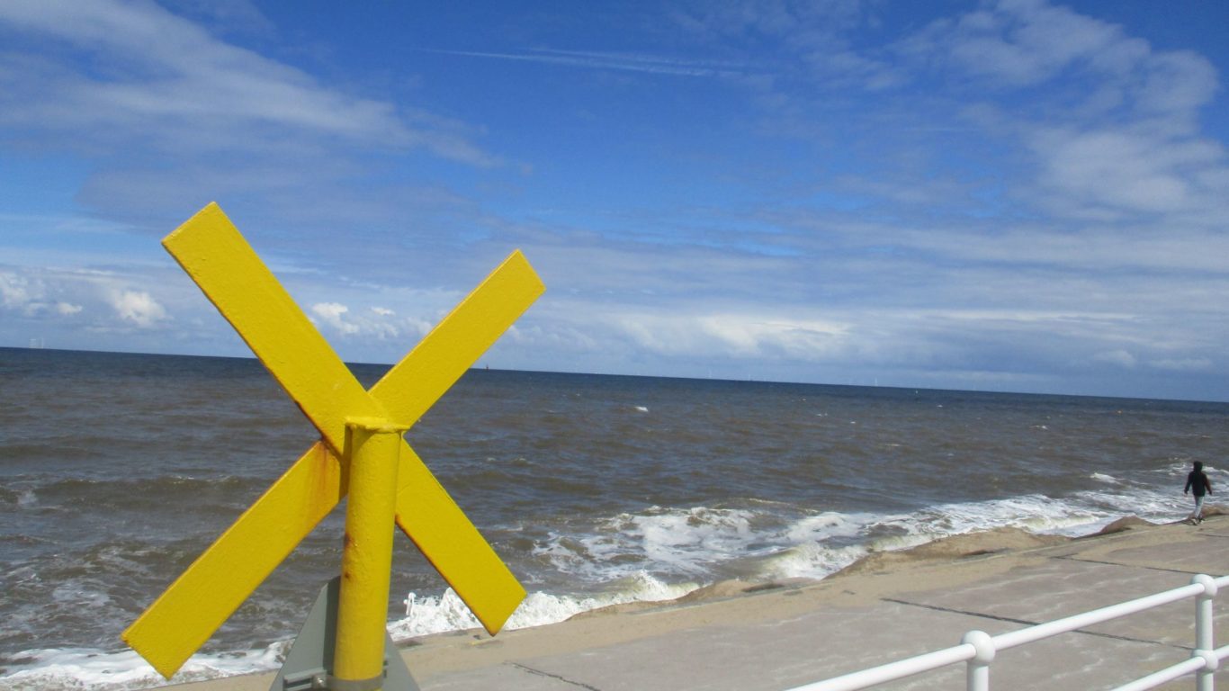 Beaches-yellow-cross-walker-blue-sky