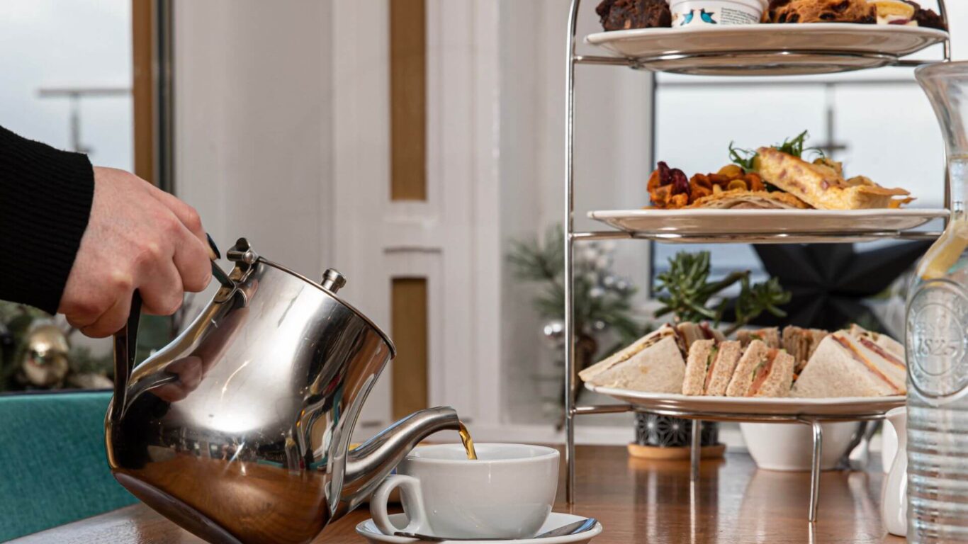 pouring tea, the beaches hotel