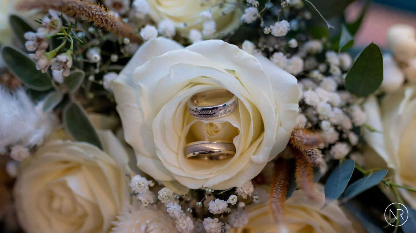 Nathan-Roberts-wedding-rings-in-the-bouquet-logo